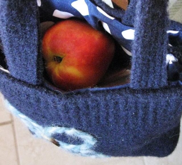 lunch tucked inside an upcycled sweater tote